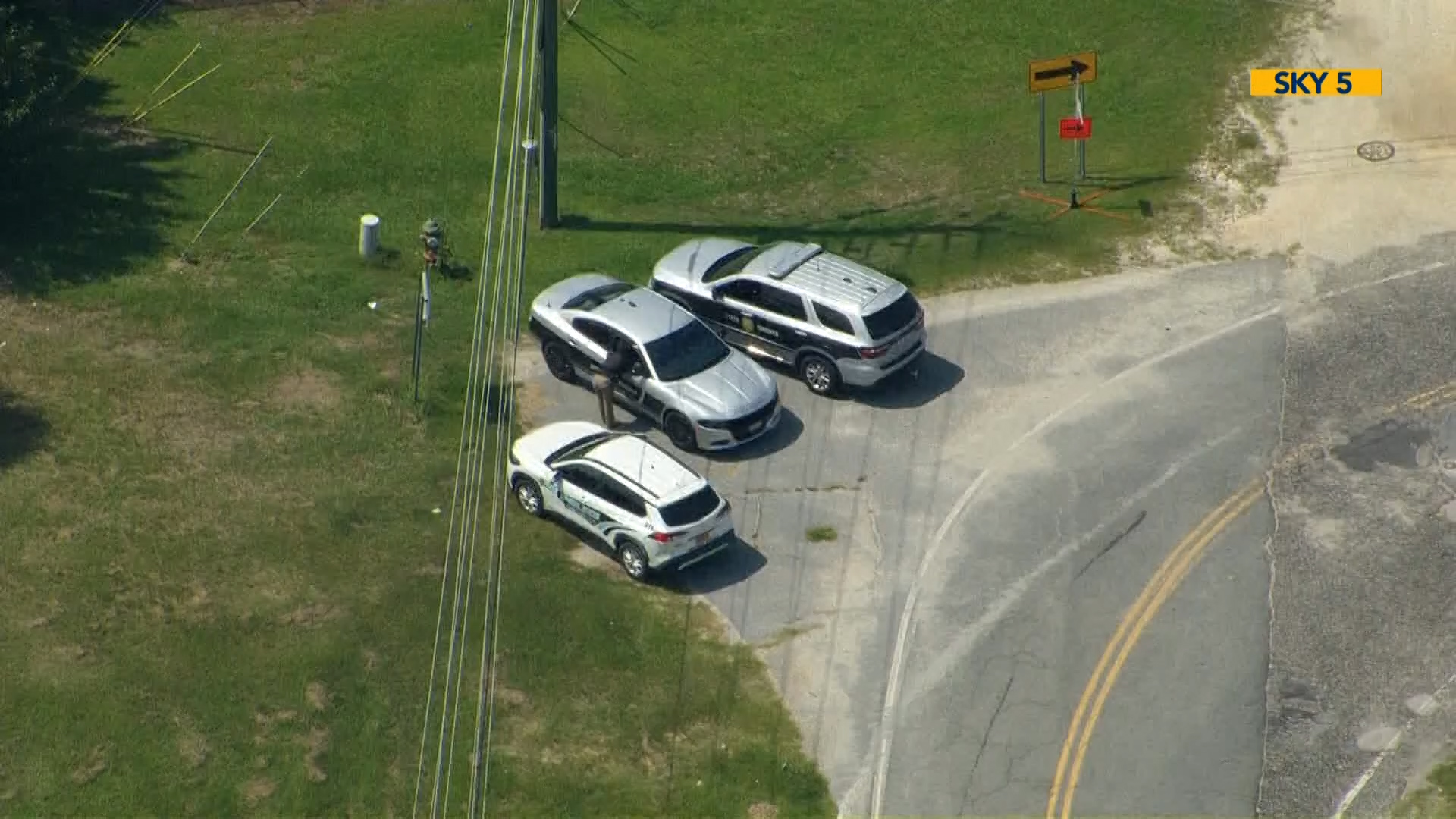 Multiple agencies searching for a man who fled a Benson crash scene